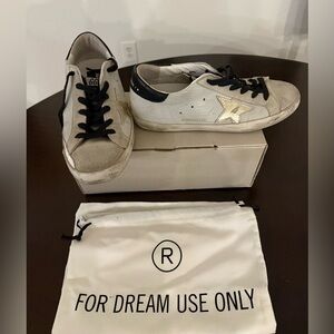Golden Goose Cream and Black Star Sneakers